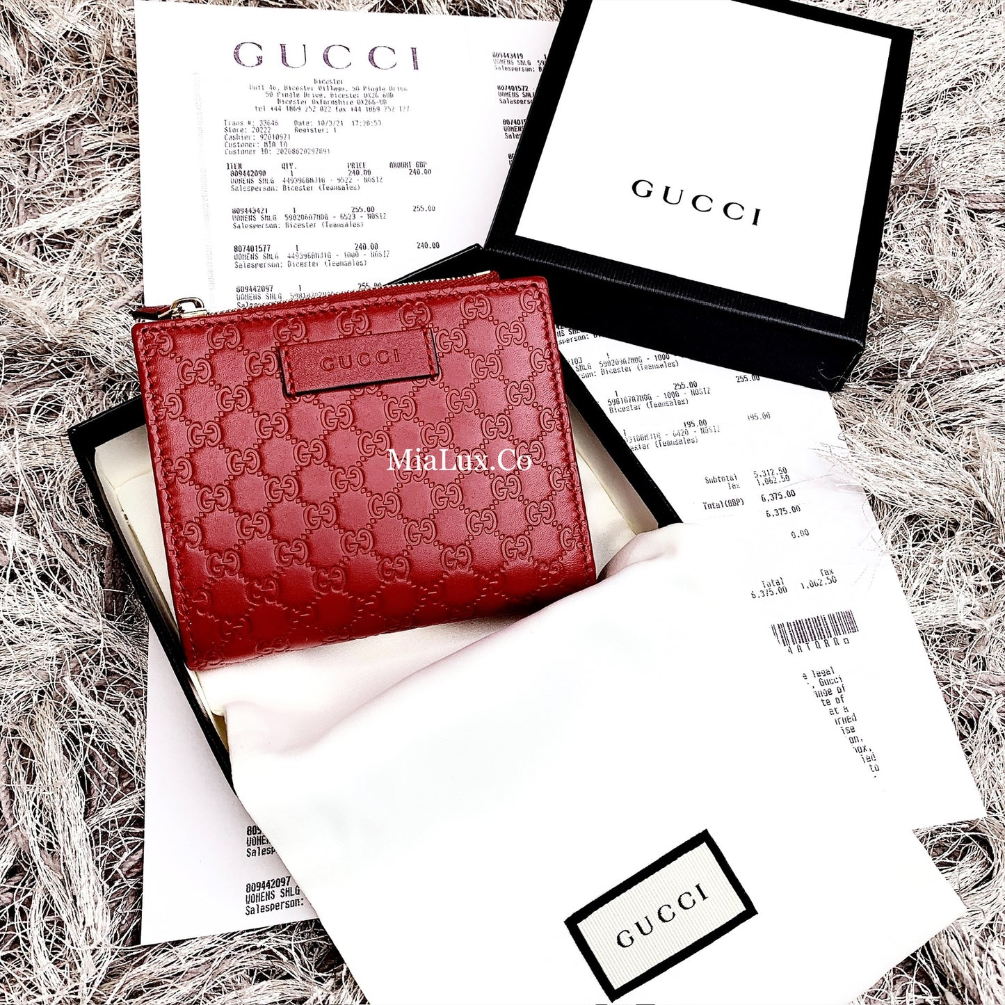 @Gucci Embossed Wallet 壓紋雙開內拉鍊短夾/P230