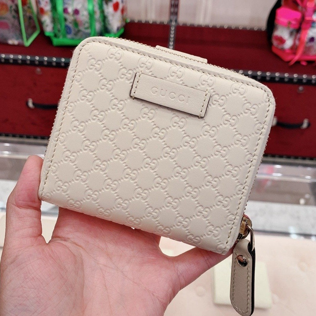 @Gucci Embossed Wallet 壓紋雙層拉鍊短夾/P230