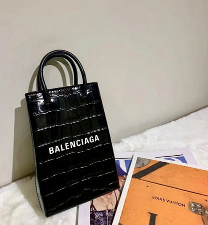 @Balenciaga巴黎世家 Shopping Phone 鱷魚手機包/920P600 🔔限時折🉐27800