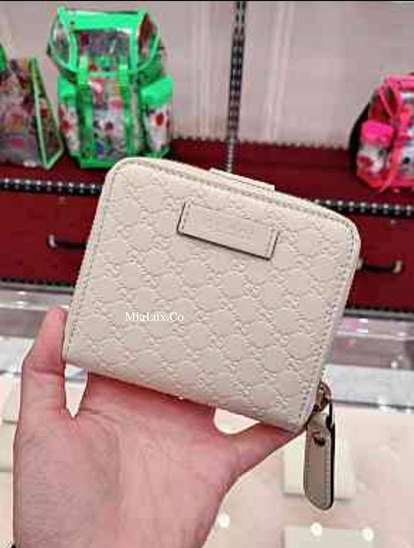 @Gucci Embossed Wallet 壓紋雙層拉鍊短夾/P230